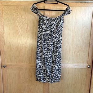 Off the shoulder navy and white patterned Reformation knee length dress.